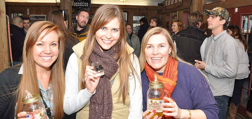 Amy, Lea Anna, and Audra sampling the Firefly spirits.