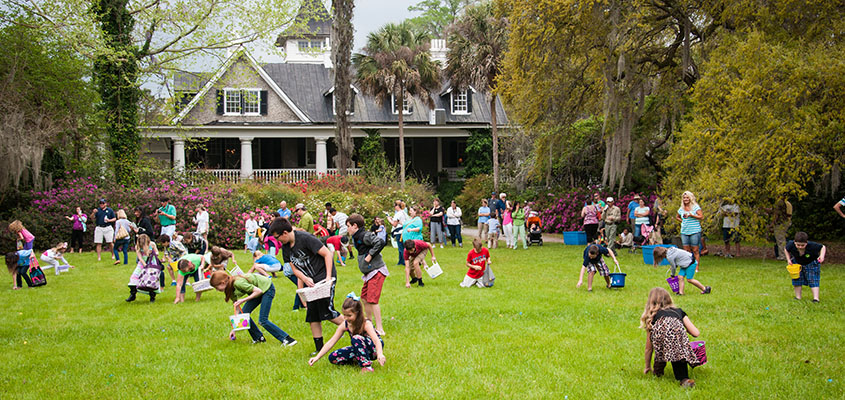 Children hunt for eggs during Magnolia's Annual Easter Egg Hunt. &copy; 2014 Audra L. Gibson. All Rights Reserved.