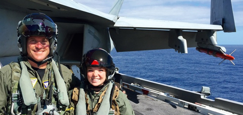 The Flatleys also have 22 grandchildren. Pictured right, one of Jim and Nancy's granddaughters, Meghan Brophy, who currently attends the Naval Academy stands with her dad, Rich, also a Navy pilot. All rights reserved.