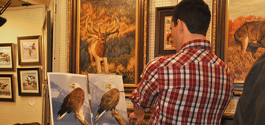 SEWE Painter, Ryan Kirby, takes a step back to check his source in the Quick Draw Event. &copy; 2015 Audra L. Gibson