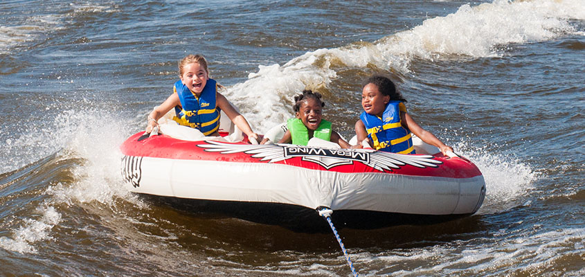 Pure joy tubing at Camp Happy Days. &copy; 2014 Audra L. Gibson. All Rights Reserved.