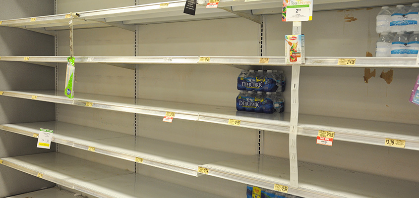 Water shelves emptied as people prepped for Winter Storm Leon. &copy; Audra L. Gibson. All Rights Reserved.