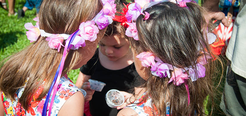 Volunteers distribute ladybugs to children to release into the gardens. &copy; 2016 Audra L. Gibson
